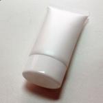 shiny plastic tube for hand cream with oval screw cap