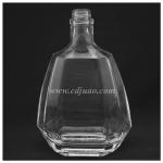 Empty flint glass whisky bottles