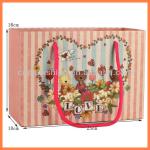 Low price fashion flower pattern paper bag with handles H1214010