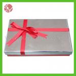 Tie gift small cardboard boxes with lids