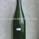 Round dark green champagne bottle