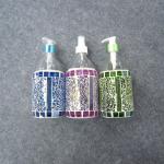 colorful lotion bottle with glass mosaic deco