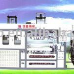 Plastic container vaccuum forming machine