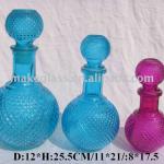 different sizes colored beautiful glass bottle for wine