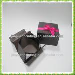 Foldable cardboard packaging box with magnet closure