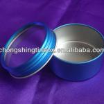 Small round tin box with clear window
