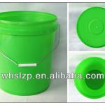 green paint pail with metal handle