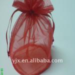 red organza drawstring pouch with round bottom