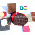 Paper cushion pad for confectionary packaging
