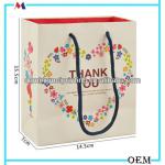Professional manufacturer Dongguan China provide handemade paper gift bags with handle/offset printing supplier low price
