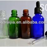 small green glass dropper bottles