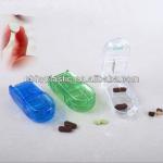 plastic pill box with cutter