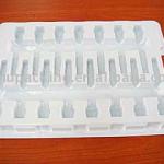 white plastic disposable tray for injector packing