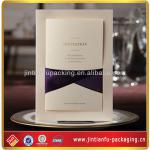 white wedding invitation card with purple silk