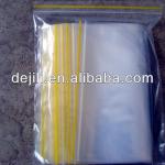 transparent plastic ziplock bag with yellow line